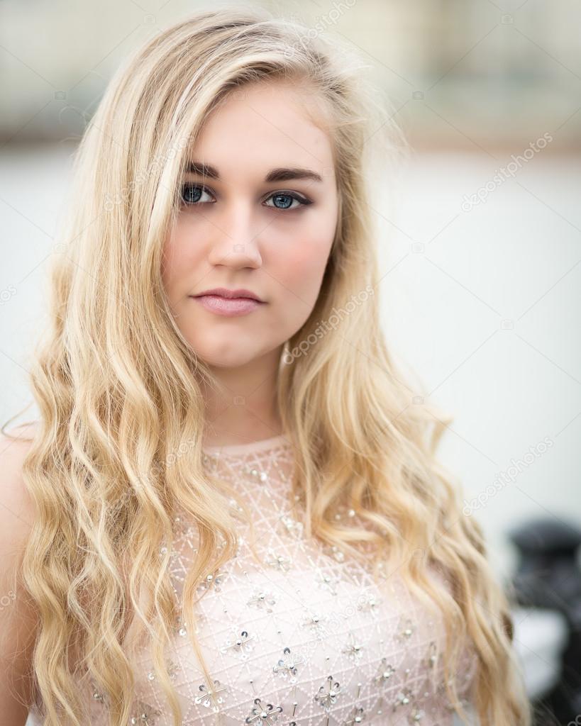 Pretty Blonde Girl With Blue Eyes