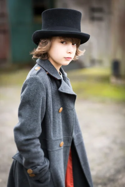 Boy in Long Coat and Top Hat — Stock Photo, Image