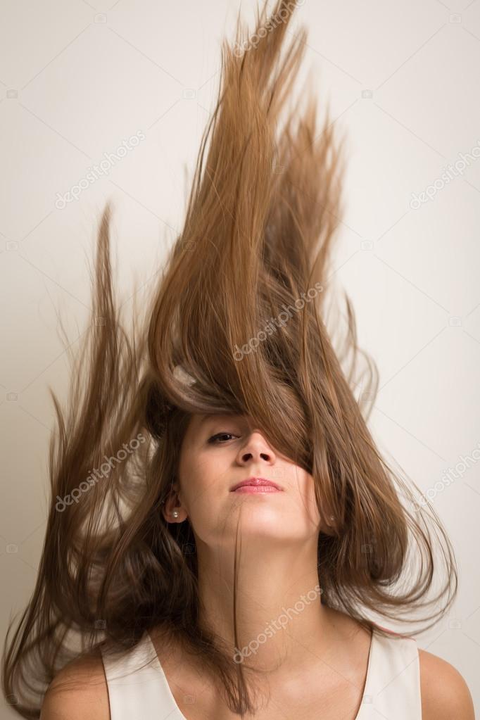 Woman flipping her hair up