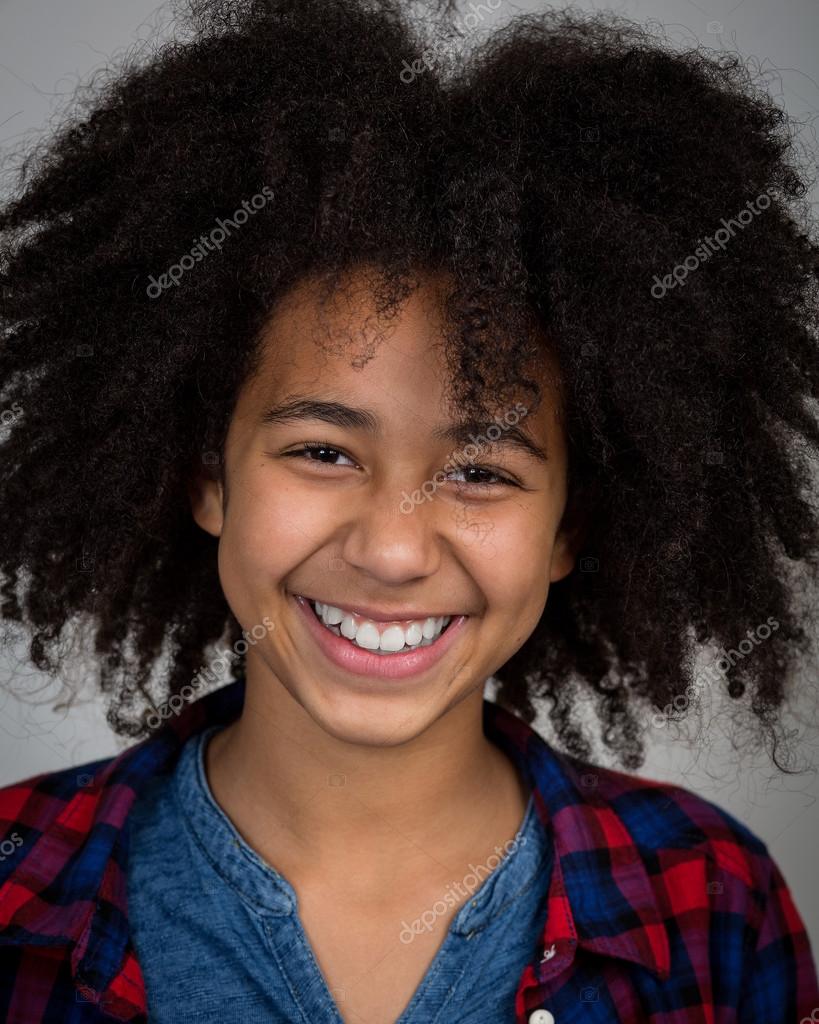 Mixed Race Girl With Afro Hair Style Laughing Stock Photo by ©Heijo 61622715