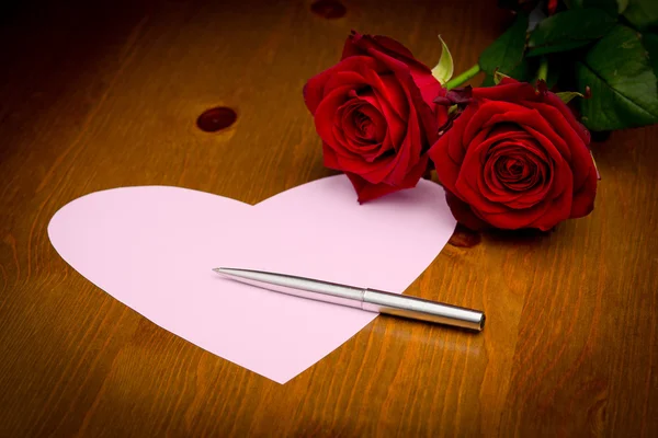 Pink Heart Note With Pen And Two Roses Stock Picture