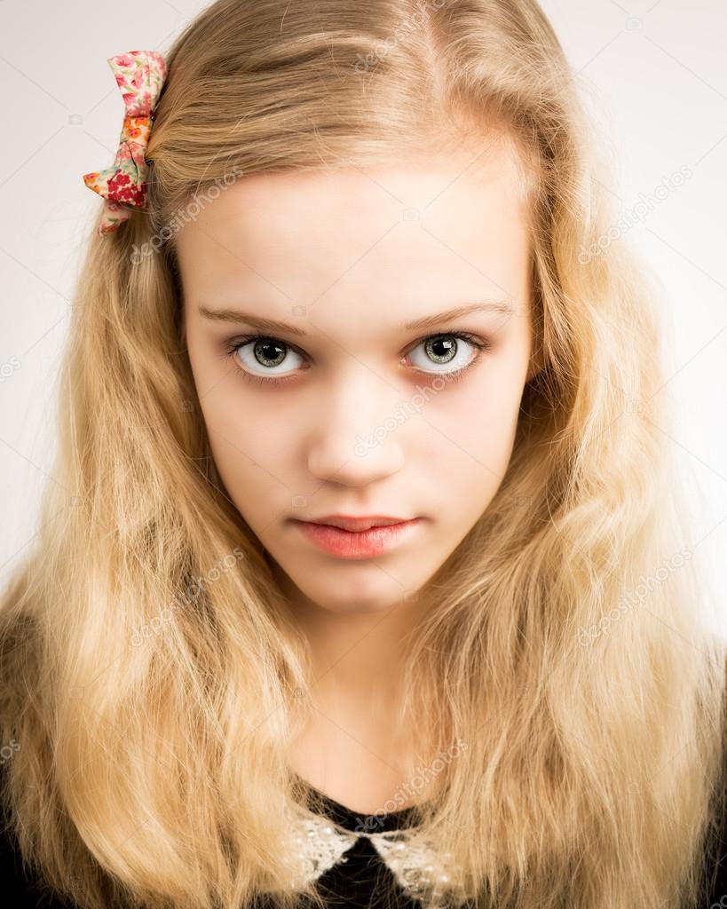 Beautiful Blond Teenage Girl Looking In The Camera Stock Photo by ...