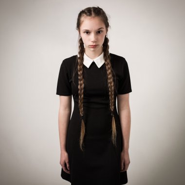 Beautiful Teenage Girl With Plaits Dressed In Black clipart