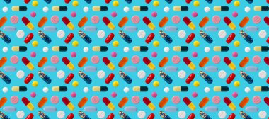 Mavi arka planda bulunan haplar, kapsüller ve haplar..