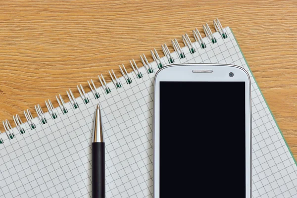 Phone pen and Notepad — Stock Photo, Image
