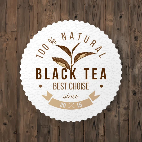 Emblema rotondo con foglia di tè disegnata a mano — Vettoriale Stock