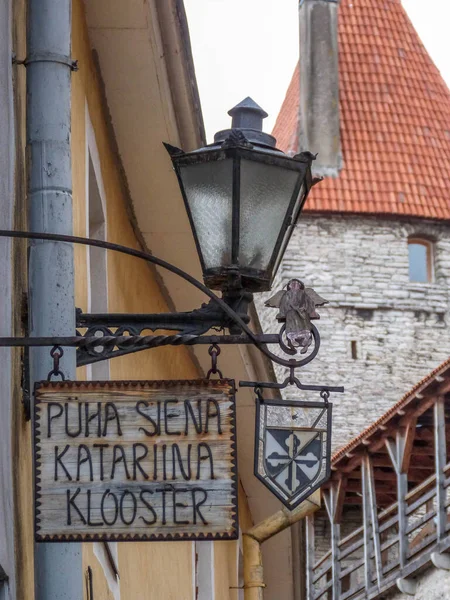 old sign and old lantern in old twon of tallinn estonia