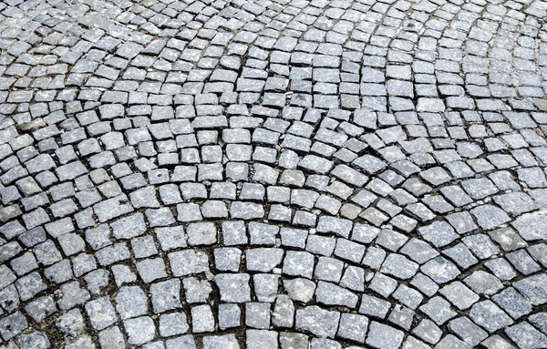 Old cobblestones road surface — Stock Photo, Image