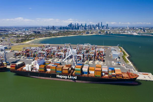 Aerial photo of cargo terminal and Melbourne CBD — Stock Photo, Image