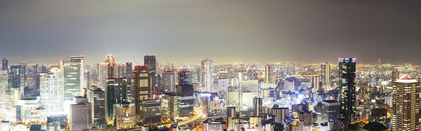 Panoramic view of skyline at night in Osaka, Japan