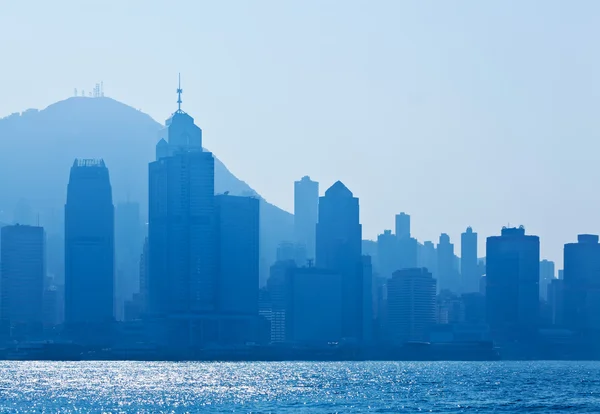 Silhouettes of skycrapers, blue tone — Stock Photo, Image