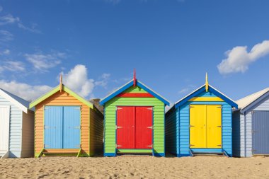 Bathing boxes in a beach with copyspace clipart