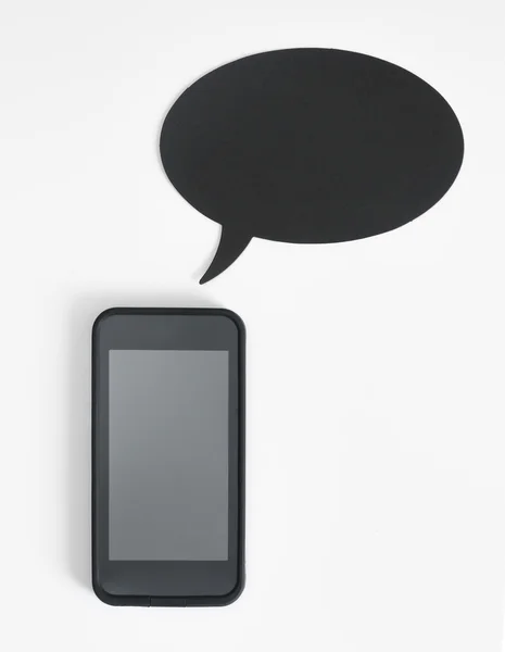 Smartphone and speech bubble with copyspace — Stock Photo, Image