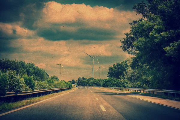 Landscape with highway and wind turbines — Stock Photo, Image