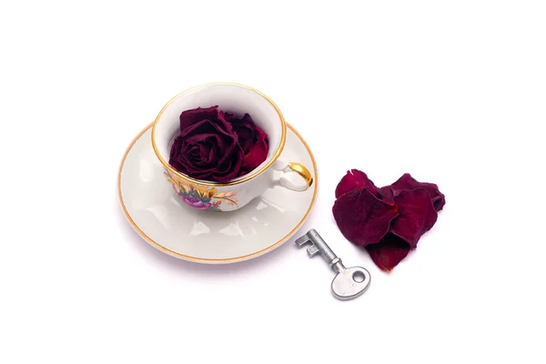 Rózsaszirom tea kulcs és a szív — Stock Fotó