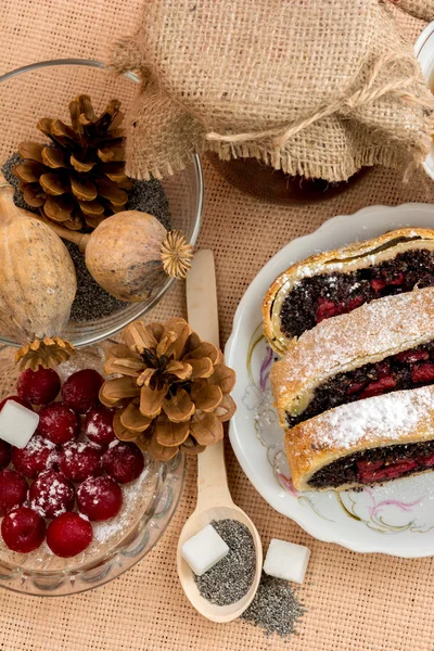Poppy seed strudel with cherry — Stock Photo, Image