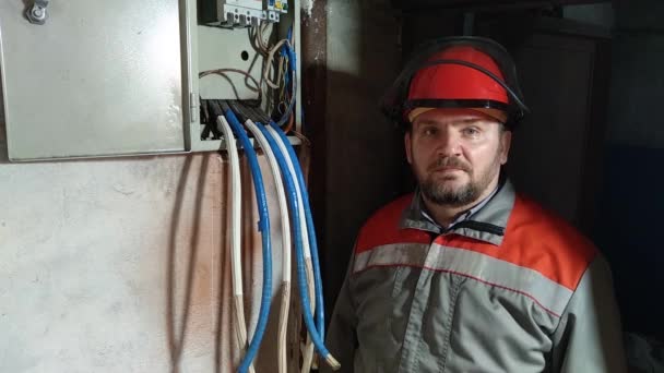 Electrician Helmet Covers His Face Protective Mask Arc Flash Face — Stock Video