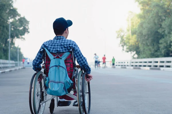 Person Disability Wheelchair Wearing Blue Shirt Cap Backpack Learn How — Stock Photo, Image