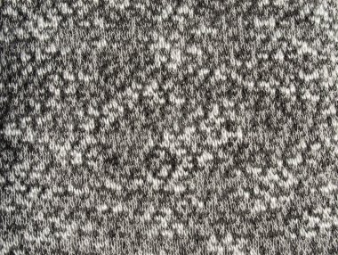 Siyah ve beyaz örme kumaş dokusu kadar kapatın. Bez arka plan.