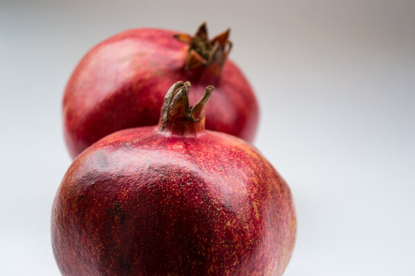 two red pomegranates fruit