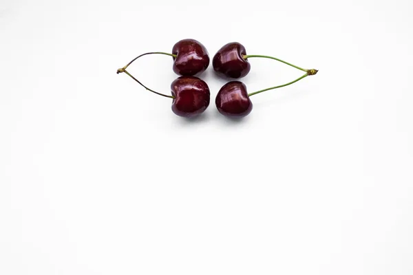 Two couple sweet cherries, isolated, copy space — Stock Photo, Image