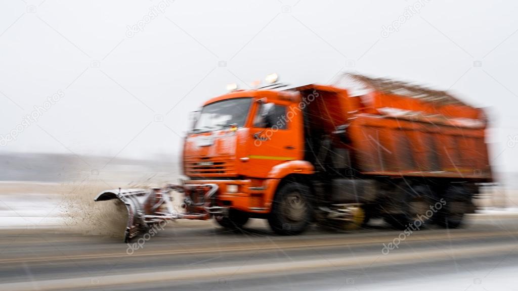 Snowplough truck removing the snow