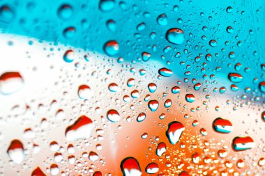 abstract orange background with water drops clipart