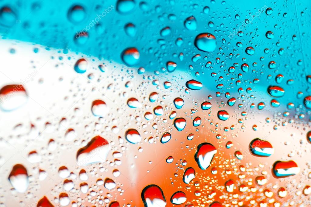 abstract orange background with water drops