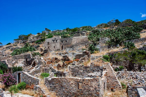 Abandoned old fortress and former leper colony, island Spinalonga, Crete, Greece. Ruined old buildings, abandoned in the late 1950s. \