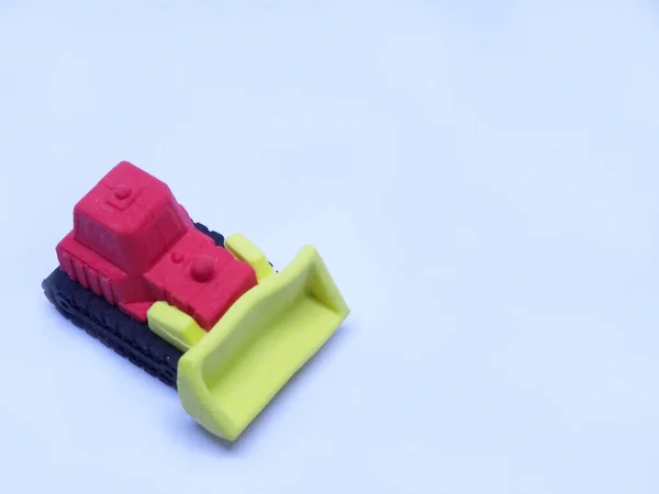 Modelo Miniatura Bulldozer Hecho Goma Sintética Pegajosa Colorida Aislada Sobre — Foto de Stock