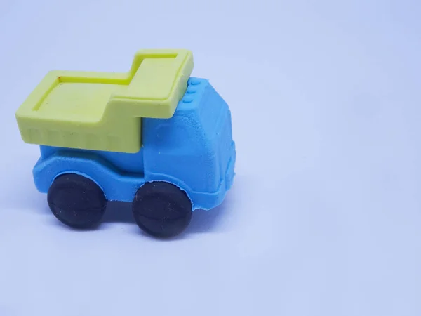 Modelo Miniatura Caminhão Construção Feito Borracha Sintética Colorida Pegajosa Isolada — Fotografia de Stock