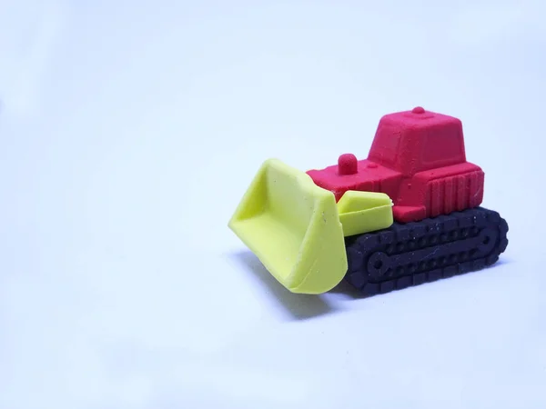 Modello Miniatura Bulldozer Realizzato Gomma Sintetica Adesiva Colorata Isolata Sfondo — Foto Stock