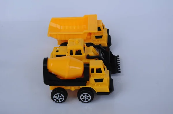 Grupa Małych Ciężkich Maszyn Budowlanych Zabawki Ciężarówka Buldożer Betoniarka Wszystkie — Zdjęcie stockowe