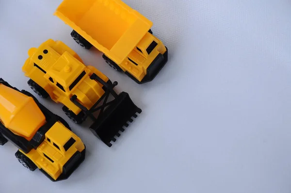 Група Невеликих Важких Будівельних Машин Іграшка Вантажівка Бульдозер Бетономішалка Пластику — стокове фото