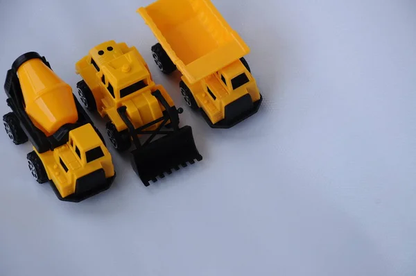 Група Невеликих Важких Будівельних Машин Іграшка Вантажівка Бульдозер Бетономішалка Пластику — стокове фото