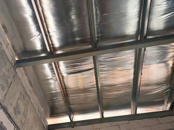 Aluminum foil sheets are used as thermal insulation of the roof. Placed under the roof layer. It can reduce the heat transferred into the building from sunlight.