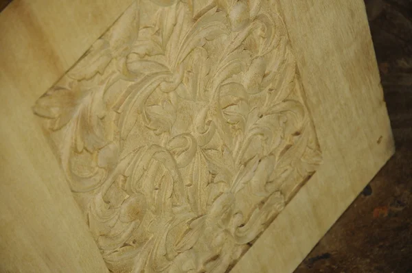 Malaysian traditional wood carving in progress — Stock Photo, Image