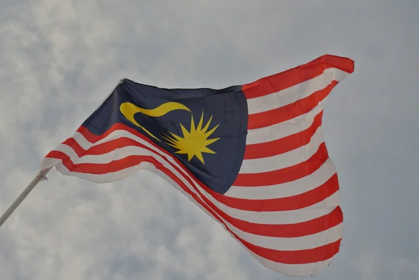 Malaysische Flagge in windiger Luft — Stockfoto