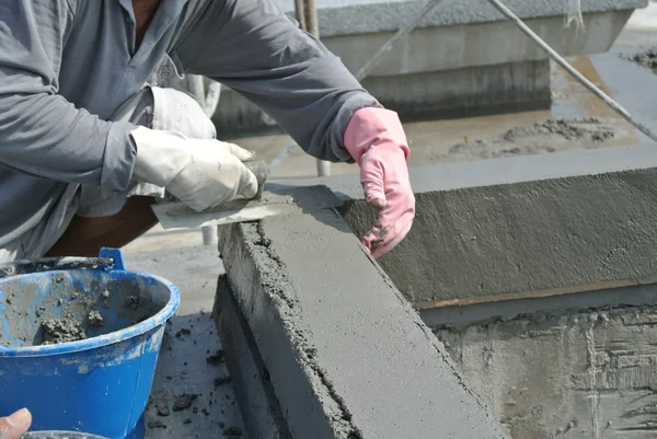 Pebble washworks by construction workers — Stock Photo, Image