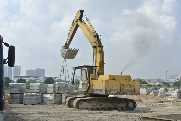 Máquina de excavadora utilizada para levantar cargas pesadas —  Fotos de Stock