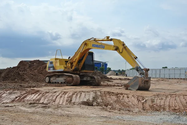 Graafmachine Machine gebruikt voor grondwerk op de bouwplaats — Stockfoto