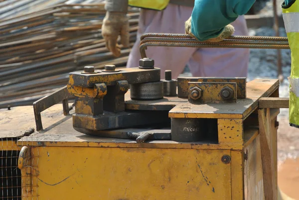 Construction workers bending the reinforcement bar at the bar bending yard — Stock Photo, Image