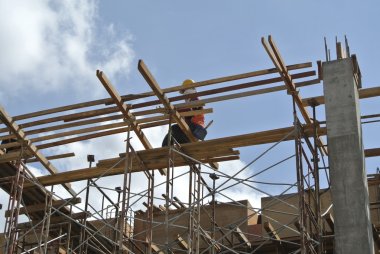A construction worker fabricate beam formwork clipart