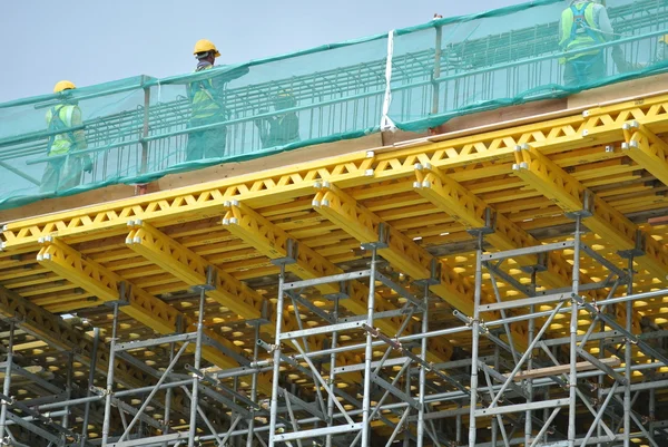 Scaffolding used to support a platform for construction workers to work