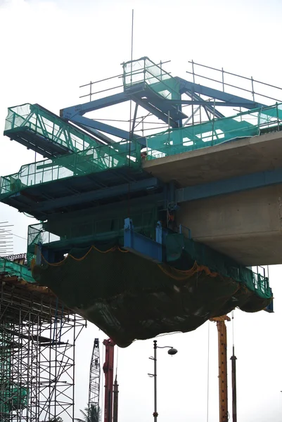 Overhead concrete viaduct under construction at the construction site — Stock Photo, Image