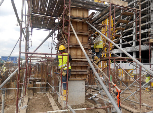 Timber column formwork under construction at the construction site