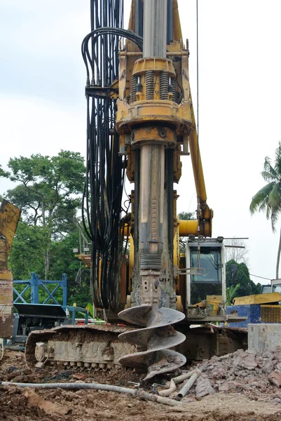 Taladro máquina de la plataforma de la pila en el sitio de construcción — Foto de Stock