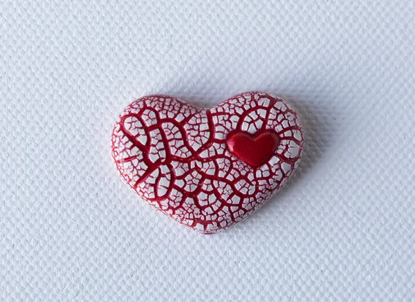 Red Crackled Heart on White Canvas — Stock Photo, Image