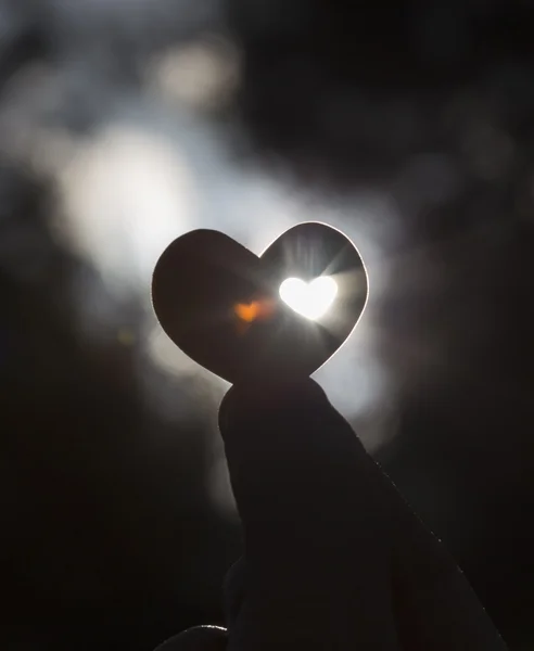 Heart shape against the Sun with Heart Ghost Shape — Stock Photo, Image