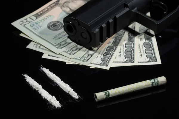 Illegal drugs , money and guns — Stock Photo, Image